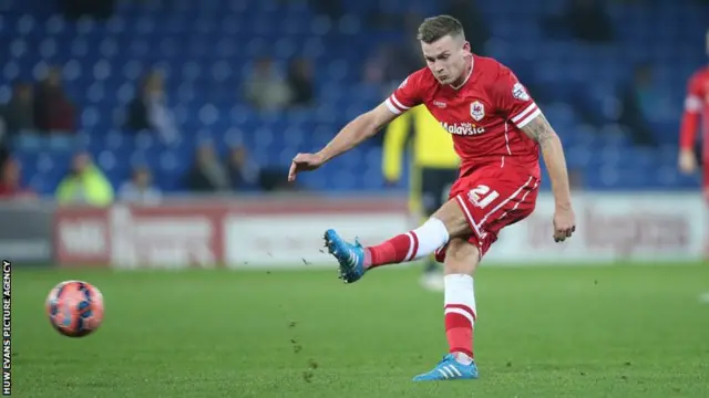 Joe Ralls shoots for goal