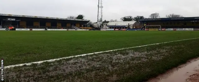 Watery pitch at Cambridge