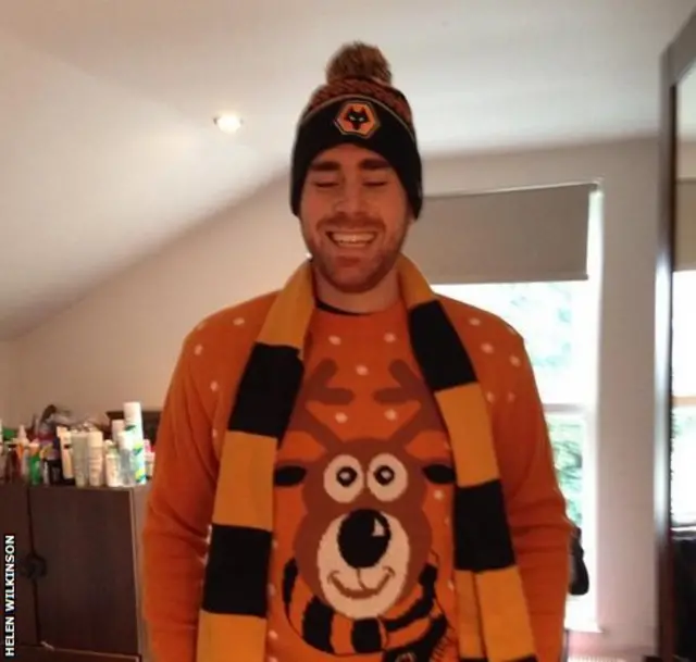 A supporter in a funny jumper