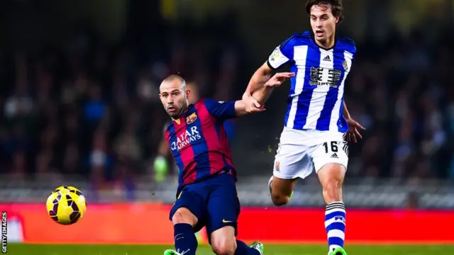 Mascherano and Canales battle for the ball