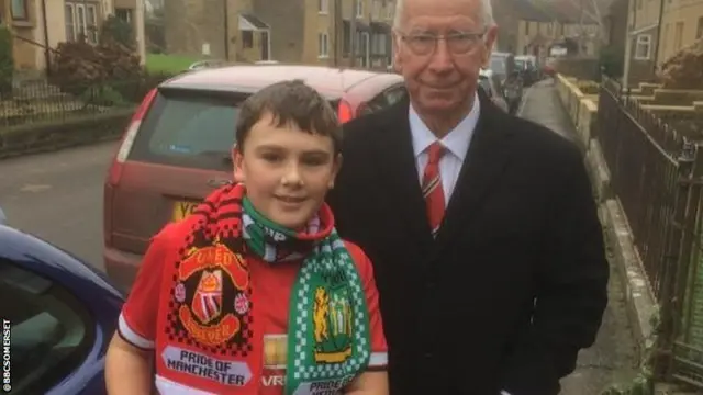 A young fan meets Sir Bobby Charlton