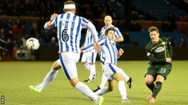 Kris Commons fires a shot at the Kilmarnock goal