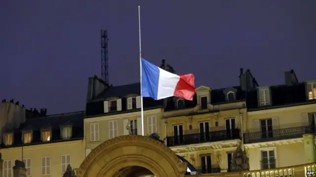 A French flag flies at half mast at the Elysee Palace