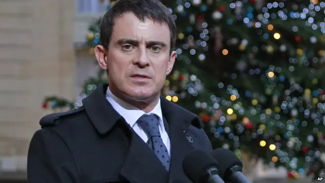 French PM Manuel Valls speaking at the French presidential palace.