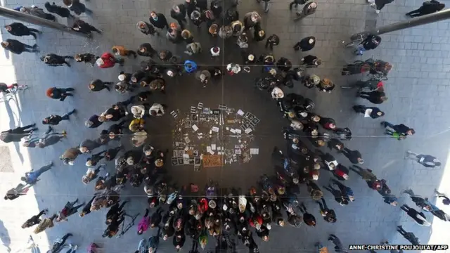 People observe a minute's silence in Marseille