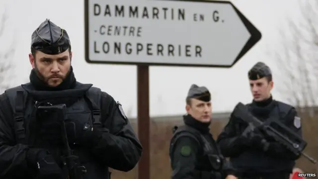 French gendarmes secure a roundabout in Dammartin-en-Goele