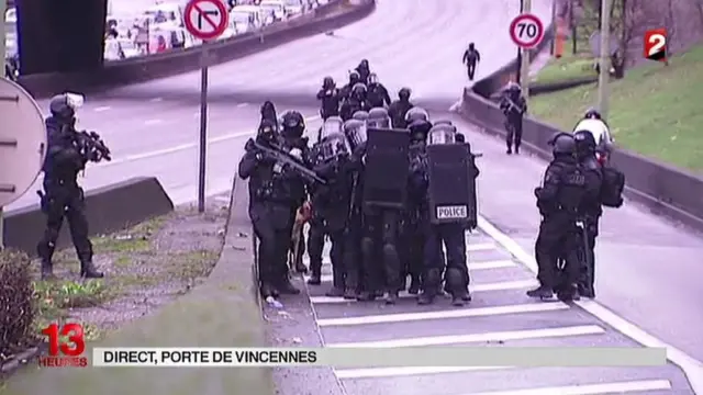 Police move to the scene of shooting in Porte de Vincennes in Paris