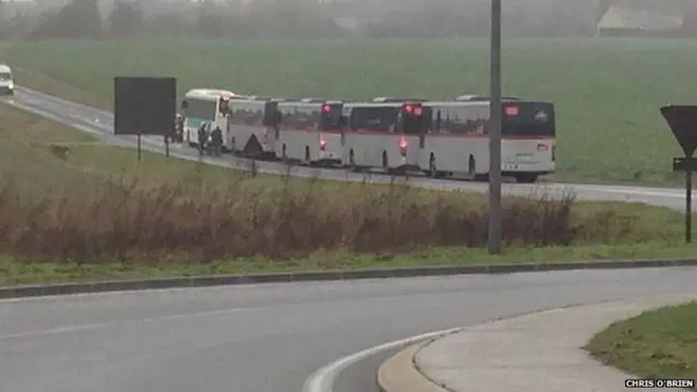 Covoy of buses coming towards Dammartin-en-Goele