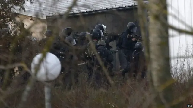 An assault group attack the CTD printing building in Dammartin-en-Goele, some 40 kilometres north-east of Paris, France, 9 January 2015.