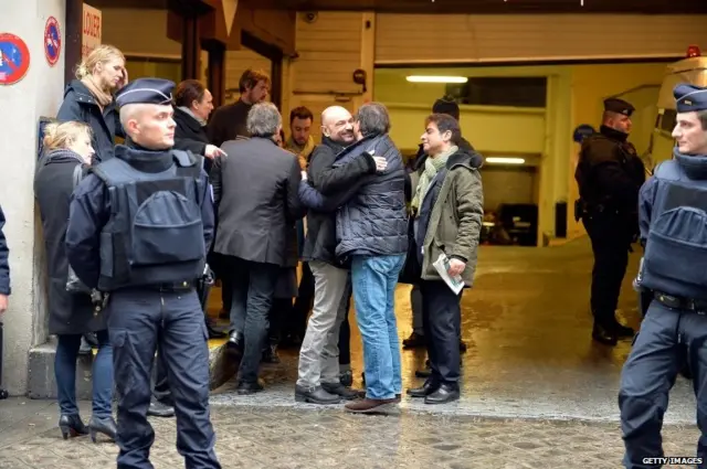 Richard Malka (C), Charlie Hebdo lawyer arrives for a meeting with the remaining editorial staff of Charlie Hebdo at the Liberation offices on January 9, 2015