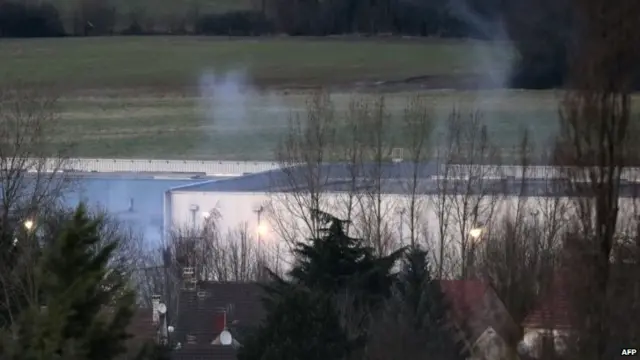 Smoke rises above siege site in Dammartin-en-Goele