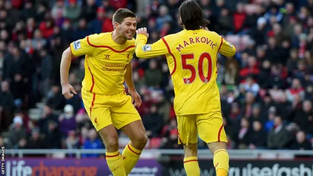 Steven Gerrard and Lazar Markovic celebrate