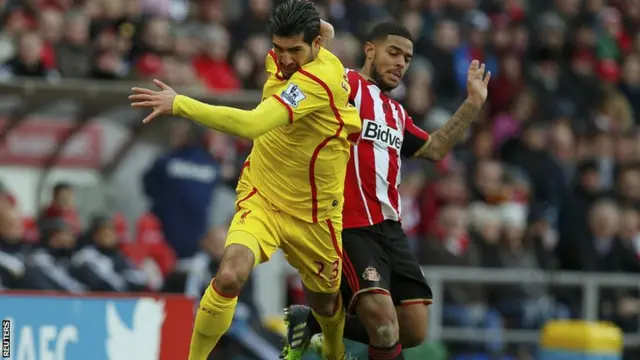 Liam Bridcutt challenges Emre Can to earn a second yellow card