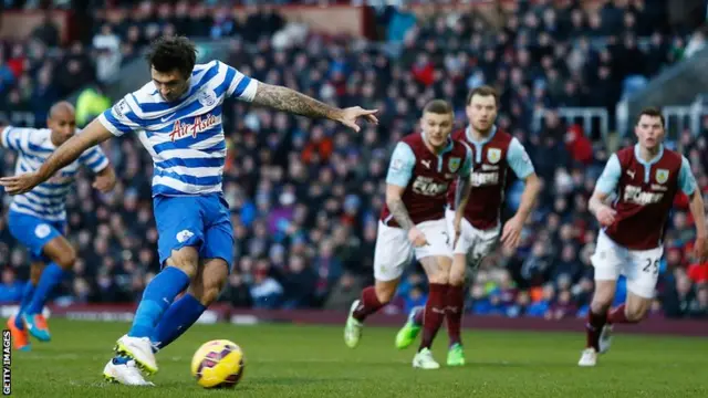 QPR striker Charlie Austin scores from the spot