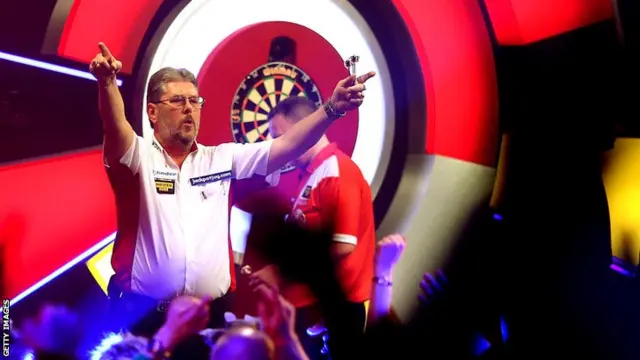 Martin Adams salutes the crowd after his semi-final win