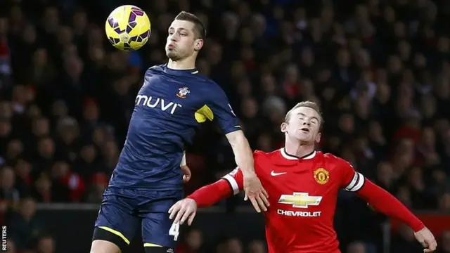 Southampton midfielder Morgan Schneiderlin (right) in action against Manchester United's Wayne Rooney