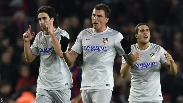 Mario Mandzukic celebrates for Atletico Madrid