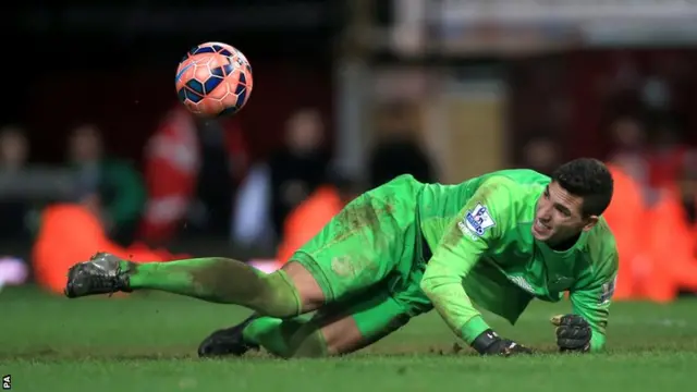 Joel Robles saves a penalty from Stewart Downing