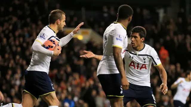 Paulinho celebrates for Spurs