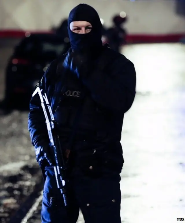 Riot police block the Rue de la Colline in Verviers, Belgium, 15 January 2015, during an anti-terrorist operation