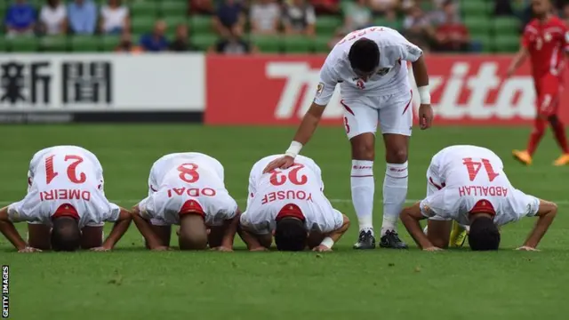 Jordan players celebrate a goal against Palestine