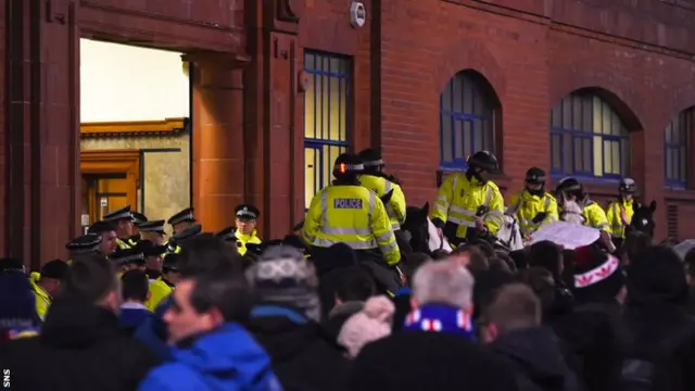 The fans protest before kick-off