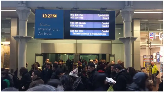 St Pancras International station with cancellation signs