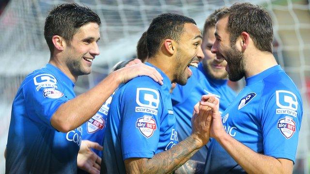 Bournemouth's players celebrate their second goal at Rotherham