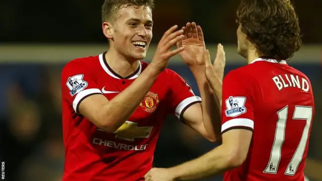 James Wilson celebrates after scoring for Manchester United