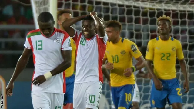 Alain Traore reacts after missing