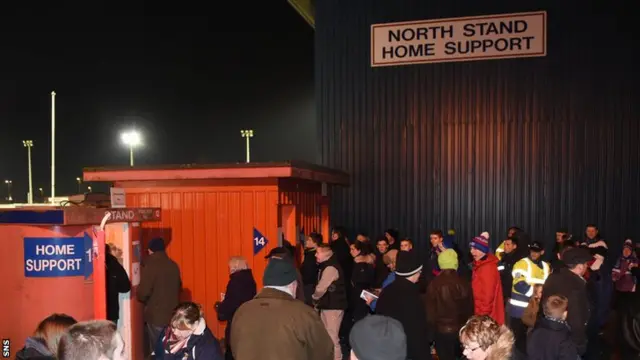 Inverness fans queue at Caledonian Stadium