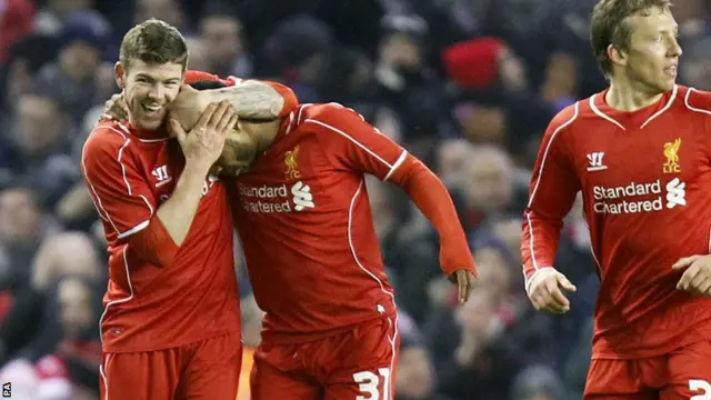 Liverpool celebrate Raheem Sterling's equaliser