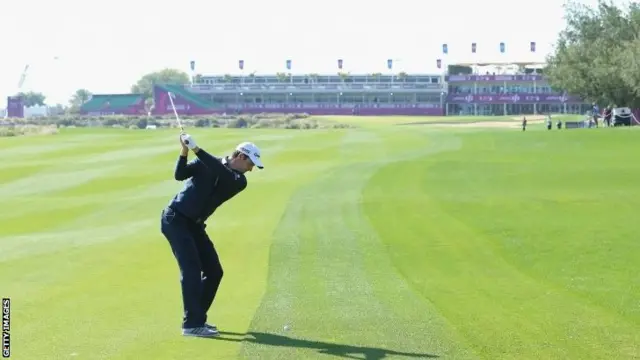 Justin Rose plays to the 18th hole at the Qatar Masters