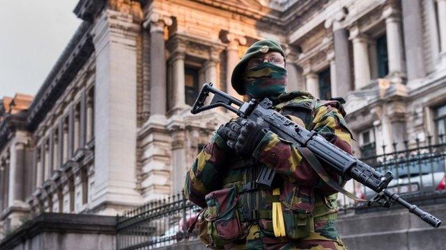 Belgian soldier stands guard in Brussels