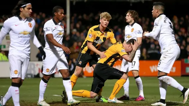 Cambridge United's Josh Coulson goes close