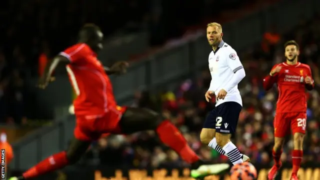 Eidur Gudjohnsen looks on as he loses the ball