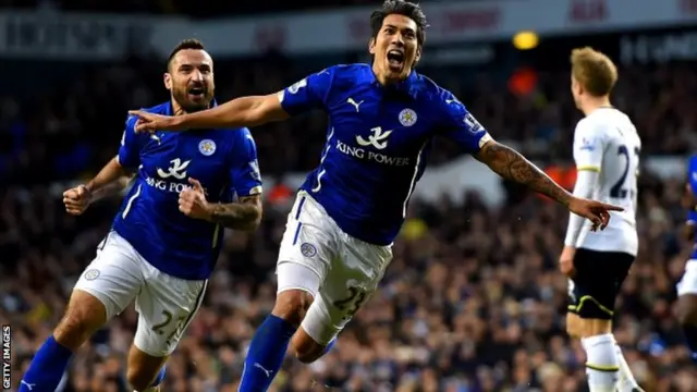 Leonardo Ulloa celebrates