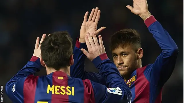 Neymar (right) celebrates with Lionel Messi