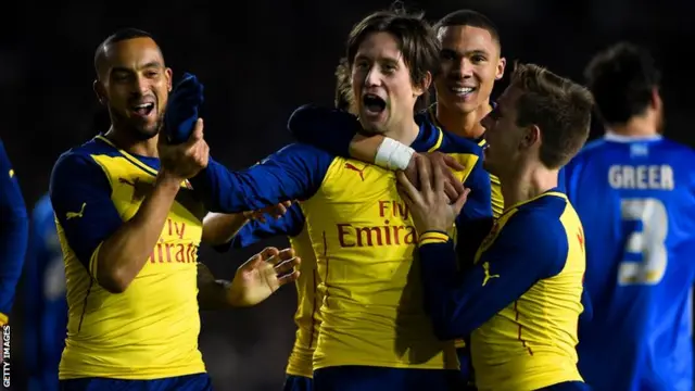 Tomas Rosicky celebrates with team mates