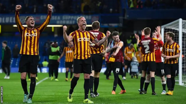 Bradford celebrate their famous victory at Chelsea