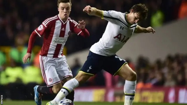 Stefan Scougal in action in the first leg at White Hart Lane