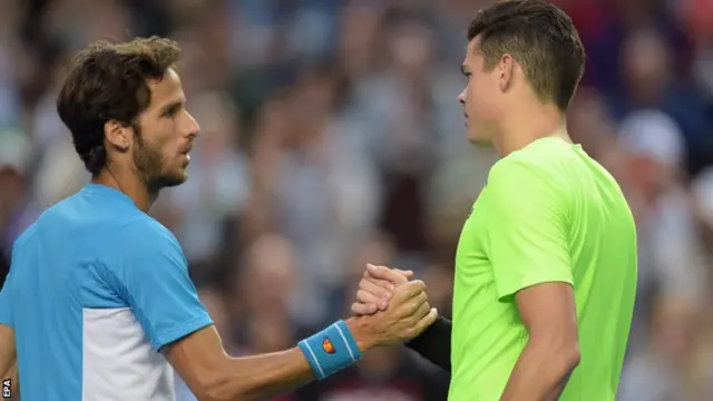 Feliciano Lopez (left) with Milos Raonic