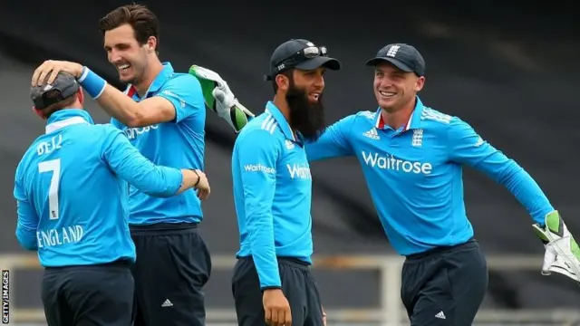 England players celebrate a wicket