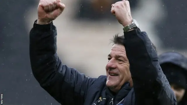 John Carver celebrates