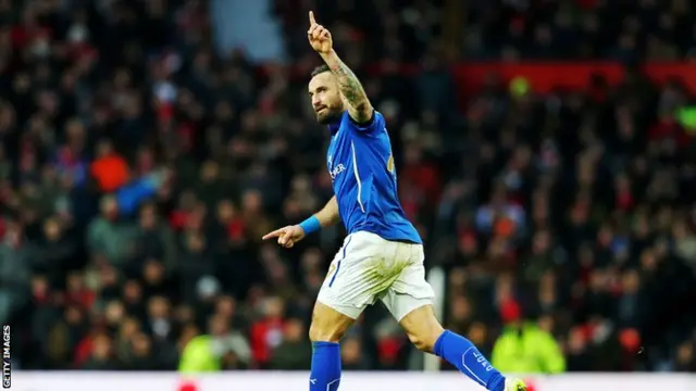 Marcin Wasilewski celebrates