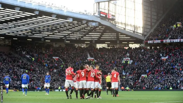 Manchester United players celebrate