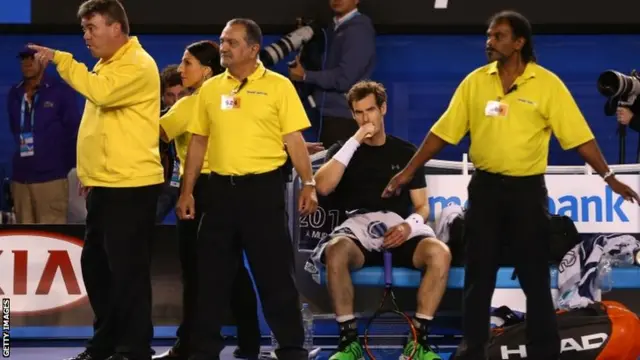 Andy Murray is surrounded by security