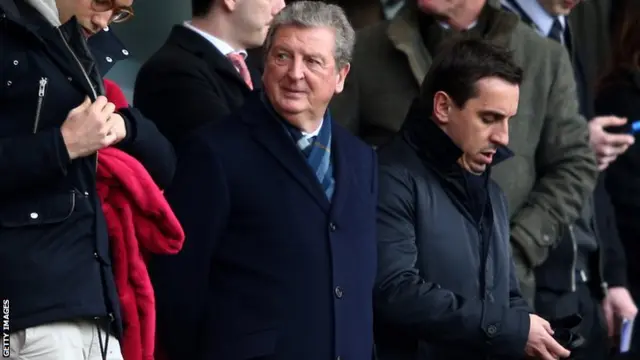 Roy Hodgson and Gary Neville at Arsenal