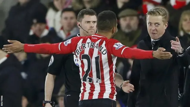 Bertrand argues with Monk over his sending off