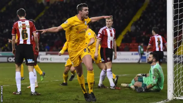 Preston's Paul Huntington celebrates